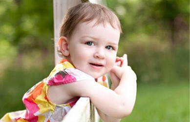 Smiling-Baby-Girl-With-Green-Eyes