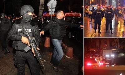 Tunisian police block the road leading t